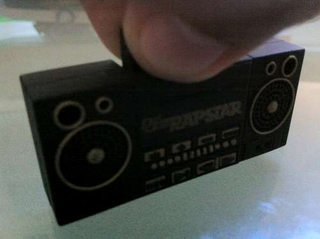 Illustration for article titled The Littlest Def Jam Rapstar Boom Box Flashdrive